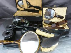Collection of dressing table brushes, some tortoise shell and other ebony.
