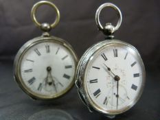 Hallmarked silver (800) pocket watch along with one other. Hallmarked one is also stamped J.St to