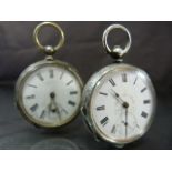 Hallmarked silver (800) pocket watch along with one other. Hallmarked one is also stamped J.St to