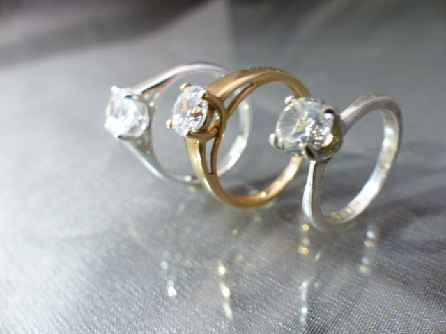Three CZ solitaire rings - (1) approx 1ct (Diamond Size) CZ gold on silver UK - P, USA - 7.5. (2) - Image 3 of 5