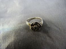 Silver ring in the form of a rose set with a central sapphire to flower head Size - J1/2 Weight