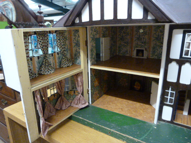 A Triang 'Stockbrokers' Tudor style dolls house, 1930s, grey painted triple apex roof, three - Image 3 of 7