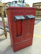 Cast iron two section Postage Stamp dispenser in red