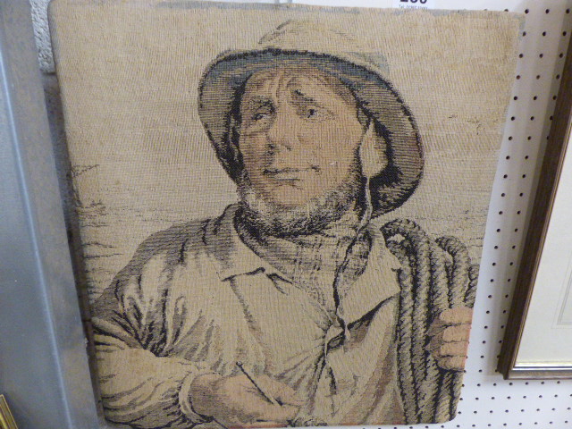 Victorian needlepoint of a gentleman with rope draped over his shoulder and holding a pipe in the