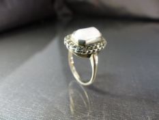Vintage Silver Rose Quartz and Marcasite ring. The Emerald shape cabochon Pale Rose Quartz stone