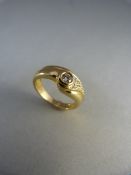 14ct /14 K Gold ring with central diamond and diamonds to one shoulder - Weight approx 5.9g Ring