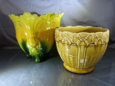 Bretby Jardiniere square tapered on four feet in green blue and yellow with floral decoration.