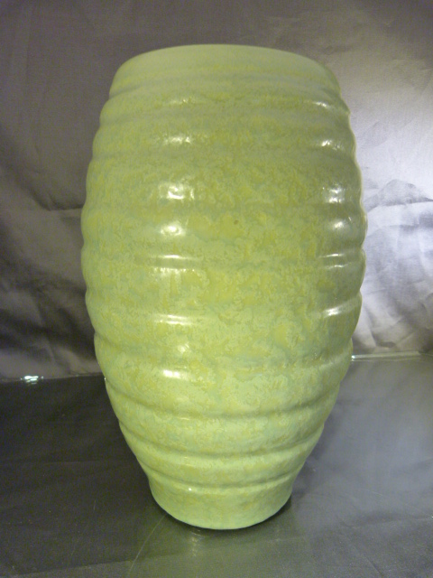 C H Brannum - Barnstaple red bodied jug. Green mottled texture to paint of banded design. Height -