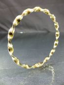 9ct Gold twisted bangle approx weight - 6g