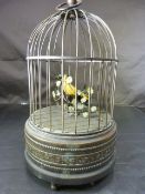 Victorian Singing Bird Automaton (Poss Bontems). The Brass case having a black and yellow bird