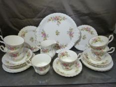 Royal Albert Tea service 'Moss Rose' pattern. Missing teapot and sugar bowl, one spare saucer.