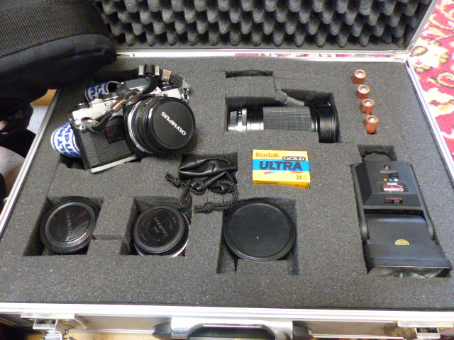 Olympus OM10 SLR camera in aluminium case with various lenses and tripod, camera cases and - Image 2 of 4