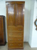 Edwardian Tallboy with cupboard over four drawers. Inlaid with floral motifs.