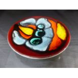 Poole Pottery shape 49 Delphis pin dish decorated with an abstract motif in tones of blue green, red