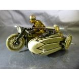 German Tinplate clockwork bike with two German Soldiers. One sat on bike and the other in a