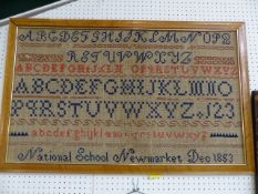 Large Victorian Sampler from the National School of Newmarket depicting the alphabet numerous