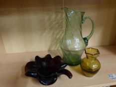 Uranium green glass jug, amber coloured vase and a heavy purple glass clover tray