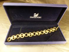 Swarovski 18ct heavily plated bracelet set with swarovski crystals, slight rubbing to plate in