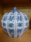 Blue and white onion shaped baluster vase with not original cover