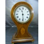 A small Edwardian mahogany cased Mantle Clock with white enamel circular dial, French movement by