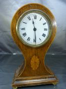 A small Edwardian mahogany cased Mantle Clock with white enamel circular dial, French movement by