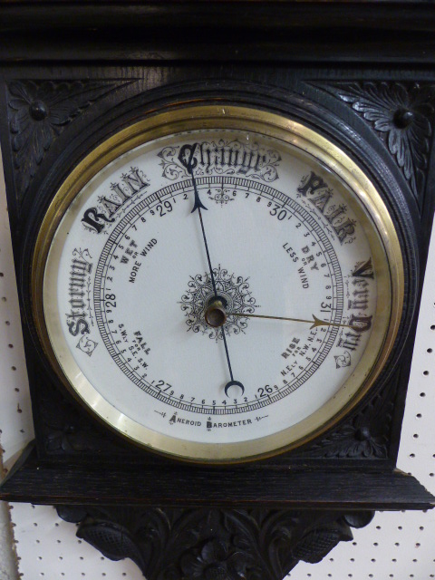 Carved oak Aneroid Victorian Barometer in the architectural style with foliate carved panels. The - Image 6 of 8