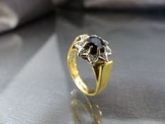 18ct Gold (Sheffield 1977) Sapphire and Diamond Cluster ring. Size approx UK - O and USA - 7