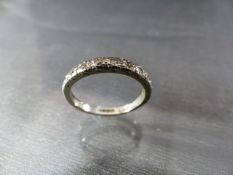 18ct White Gold half eternity ring set with 10 diamonds. Weight approx 3.1g Size UK - M