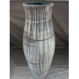 Unusual Tall West German Floor Vase in somewhat subtle colours for the Era. White Wax resist glaze