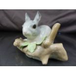 Lladro figure of a rabbit on a branch