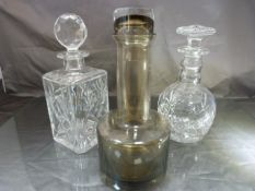 Stuart Crystal Glass Decanter, Waterford Crystal Glass Decanter and a Caithness black glass decanter