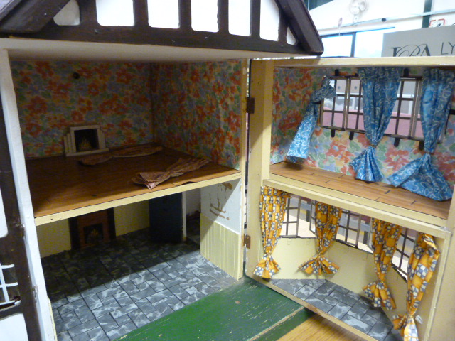 A Triang 'Stockbrokers' Tudor style dolls house, 1930s, grey painted triple apex roof, three - Image 4 of 7