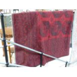 Large Wine Red ground rug with all over design. Vendor brought at Libertys but no receipt