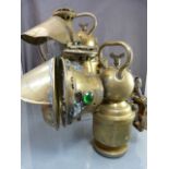 Haeckel - A pair of vintage brass lamps with green and red side glazed panels. Additional hood has