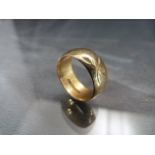 9ct Gold ladies ring with all over floral design. Total weight approx. 4g