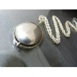 Silver (925) 1971 import mark, contemporary pendant with a polished oval convex centre. approx 35.