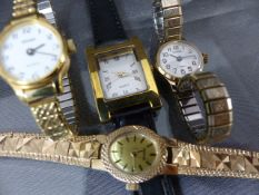 Four gold coloured dress watches, one stamped A1 to side.