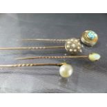Collectors Lot of 4 Gem Set stick pins. (1) 12mm Diameter top set with a Central old mine cut
