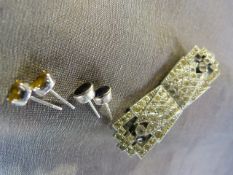 Paste set brooch which comes apart to make earrings and two pairs of earrings set with 1) yellow