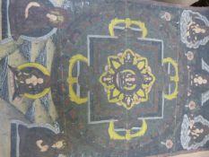 An Indian Mandala - 20th century painted onto a rectangular cloth with central star to middle,