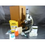 Opax school microscope in case with accessories to include an NCR Microform of the Bible