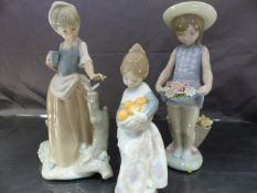 Two Lladro figures and a Nao figure - Lladro 1284 girl with flowers, Lladro 4841 girl with oranges