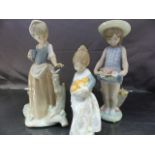 Two Lladro figures and a Nao figure - Lladro 1284 girl with flowers, Lladro 4841 girl with oranges