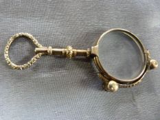 Gold coloured pair of spring loaded Pince-Nez