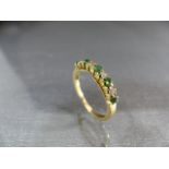 9ct Gold Half Hoop Emerald and Diamond Eternity Ring. Five approx 2.5mm diameter Emeralds and four