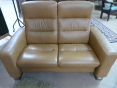 Stressless Wave high back two seater sofa with steel hoop feet in Paloma Tan Leather. Original