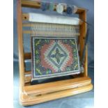 Miniature carpet on loom