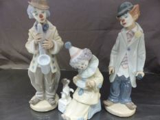 Collection of three Lladro clowns, one playing the saxophone, One holding a violin and another