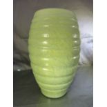 C H Brannum - Barnstaple red bodied jug. Green mottled texture to paint of banded design. Height -