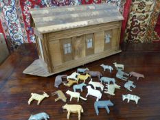 Early naive Victorian/Edwardian Ark - unpainted along with a selection of wooden animals (Some A/F)